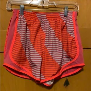 Bright orange and gray Nike medium dry fit shorts